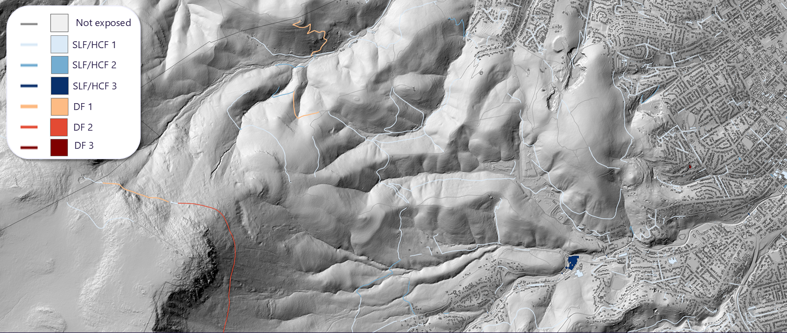 Regional terrain map with roads labelled by their highest intersecting sediment-laden-flow or debris-flow hazard class, alongside a labelled legend.